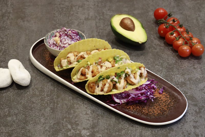 Fish tacos with chipotle slaw and avocado crema
